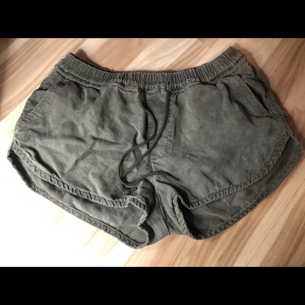 Community army green shorts.